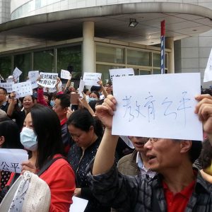 Parents protest against new education policies in Jiangsu. Image Sourced from Sixth Tone